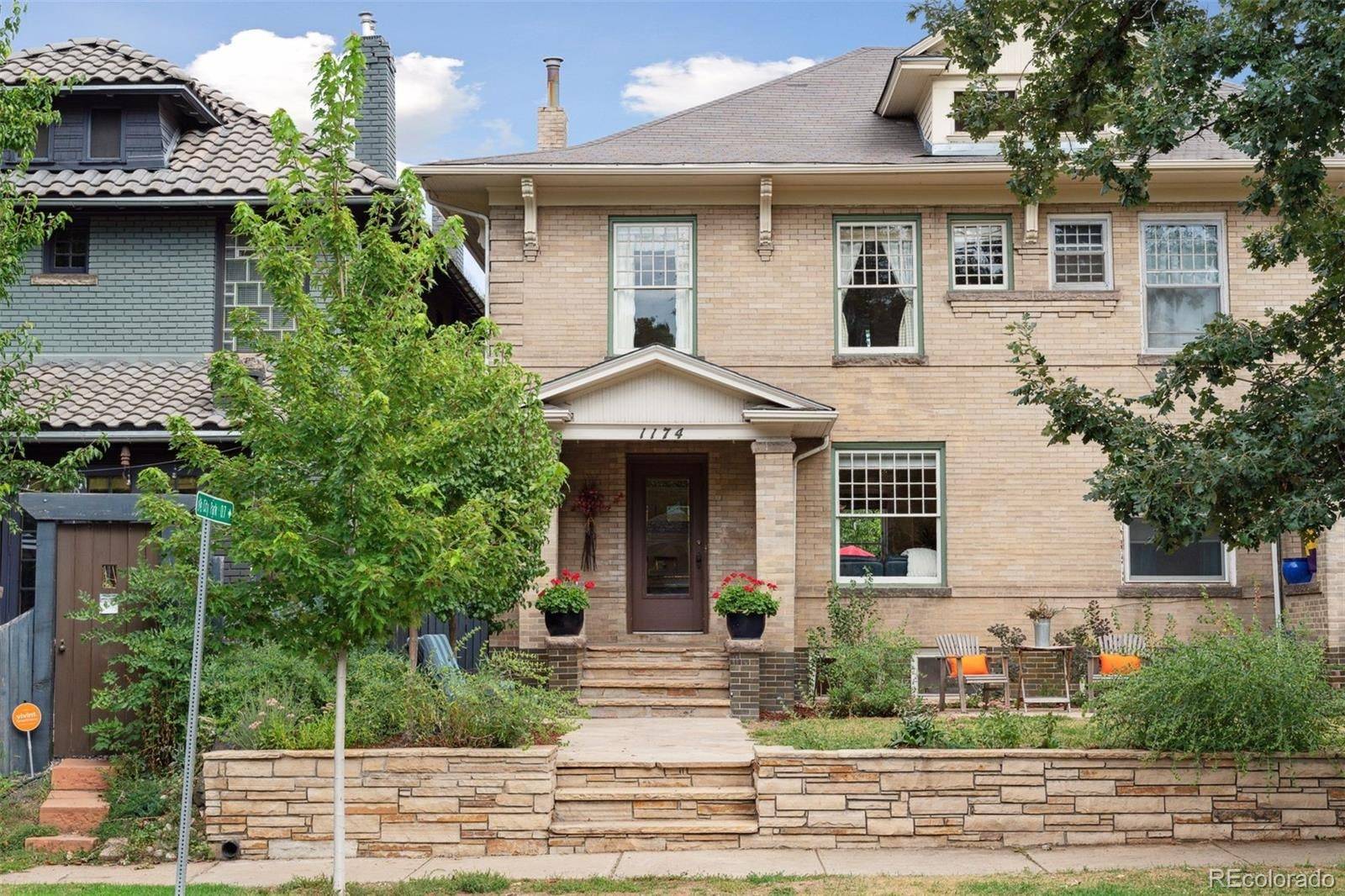 Brick facade of a 1908 Congress Park townhome sold by Pam Dunn