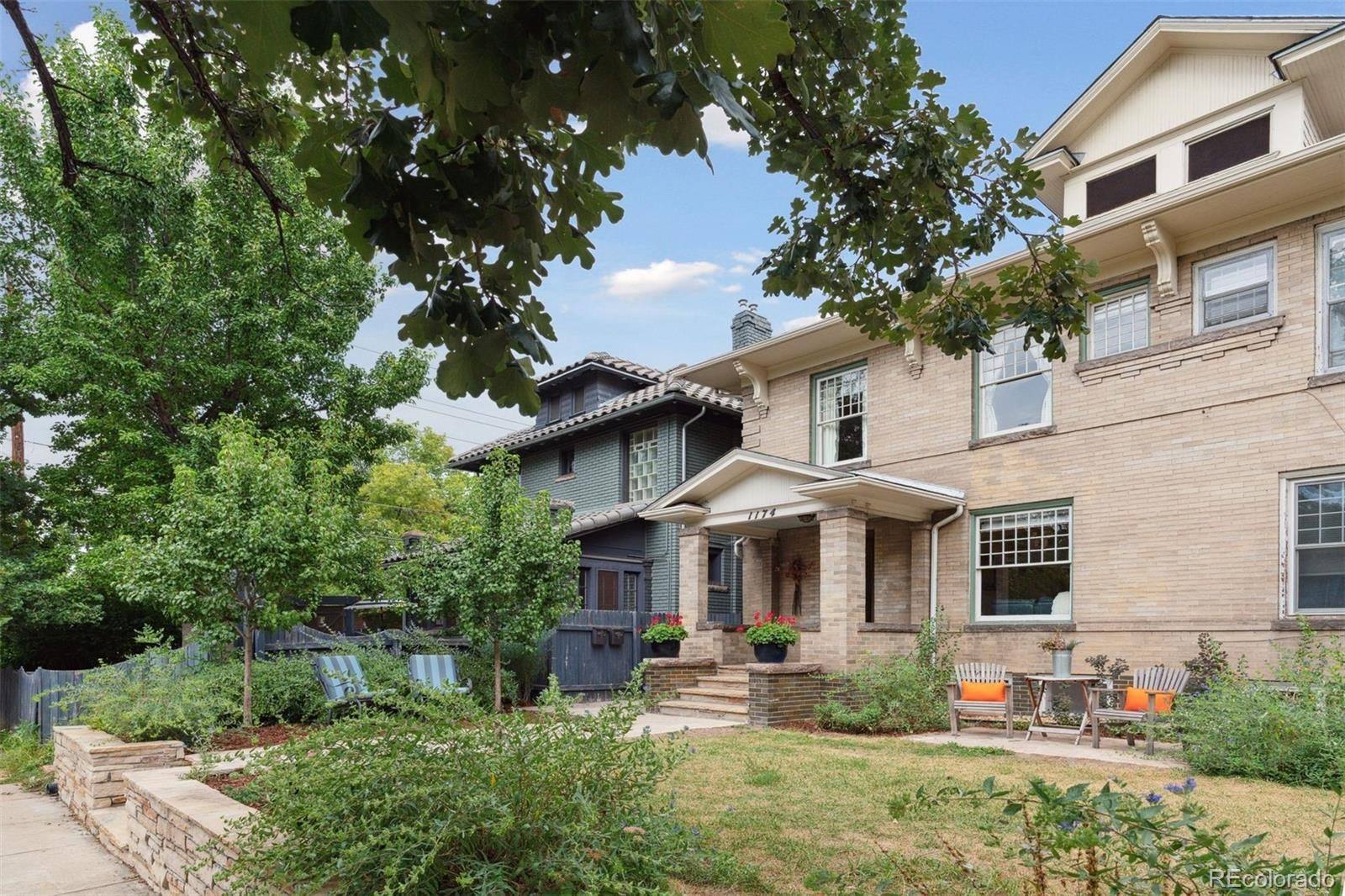 The townhome from the tree-lined sidewalk
