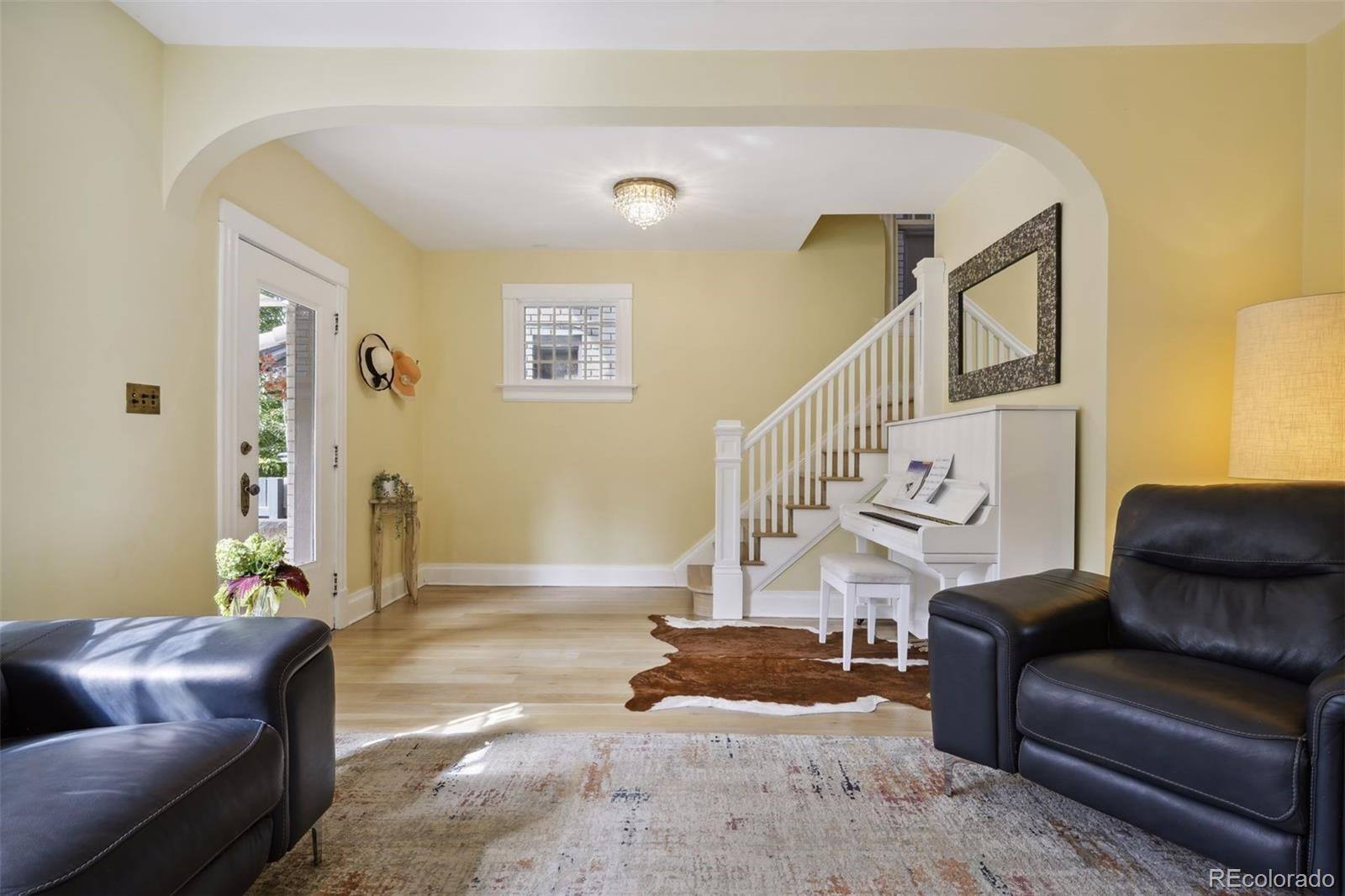 Entry with original staircase