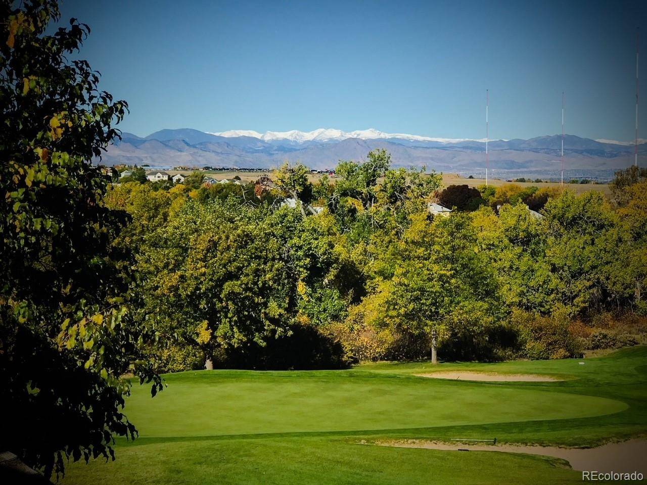 The Links Golf Course and snow-capped Front Range seen from Palomino Park