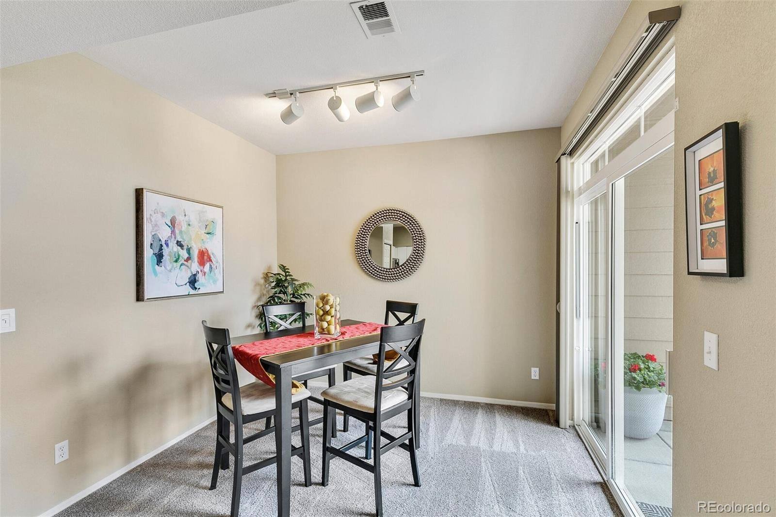 Dining area with sliding door to the patio