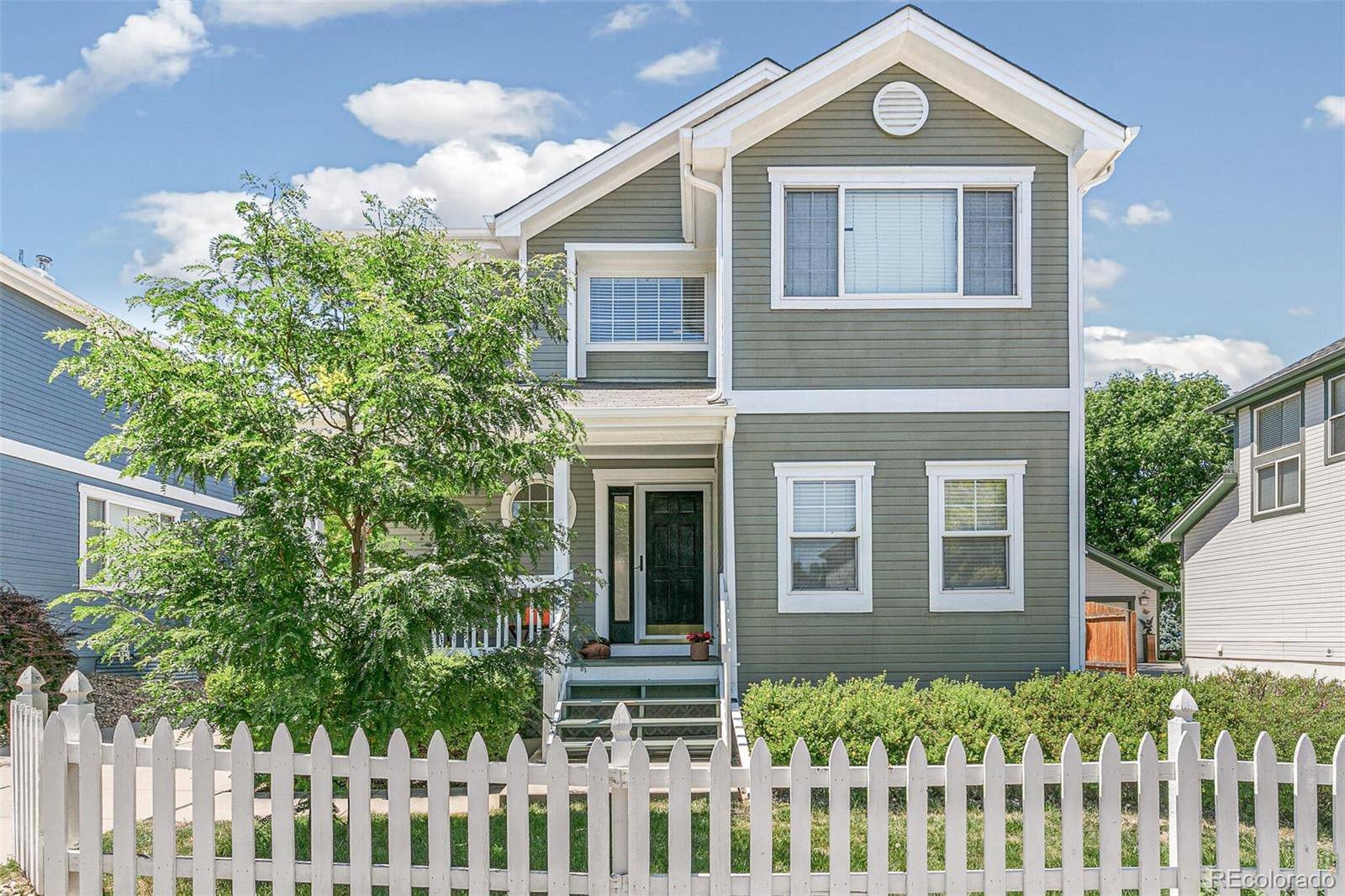 Front porch and picket fence at 8126 East Harvard Circle